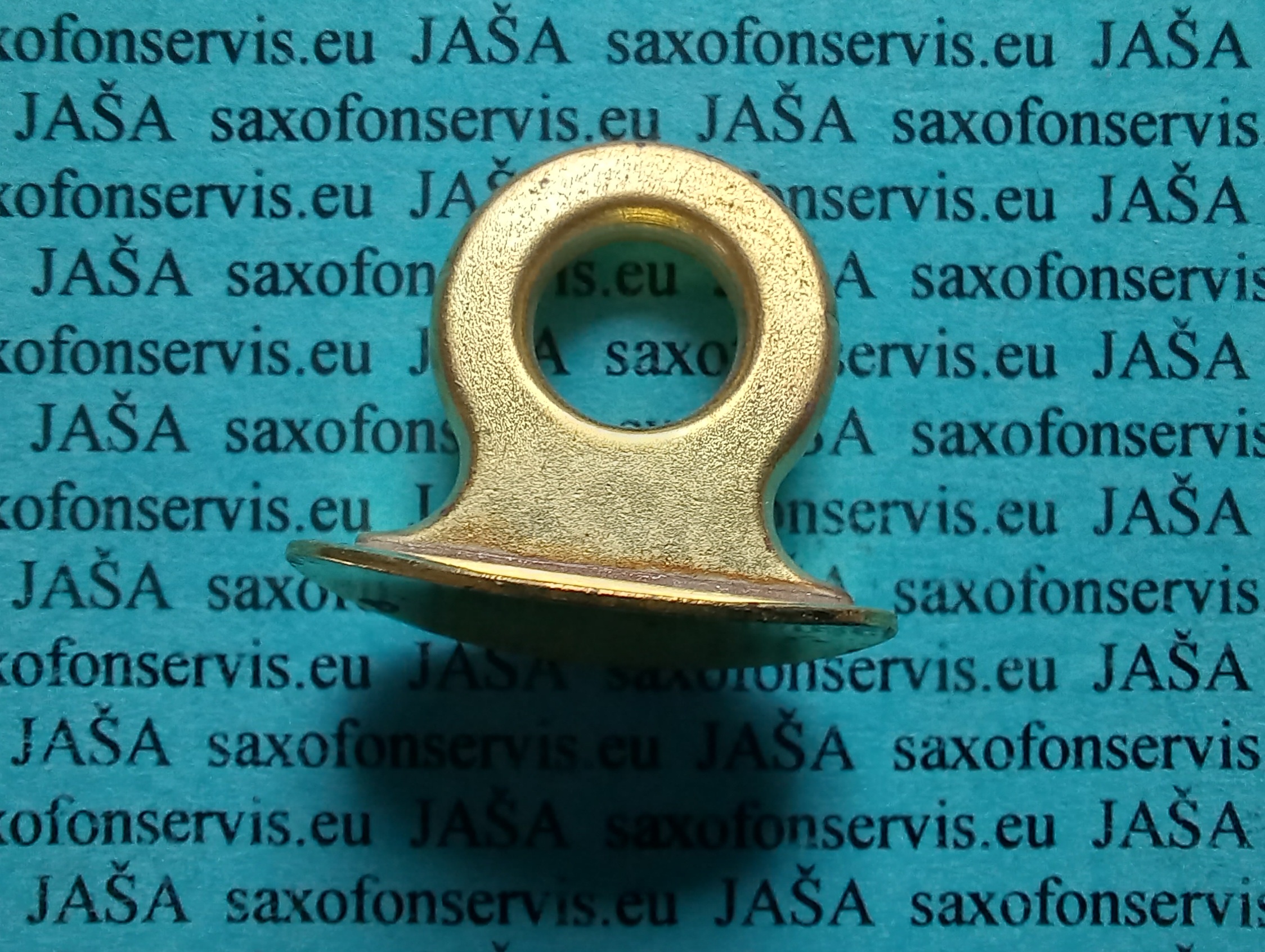 Závěsný kroužek na saxofon. (1.)